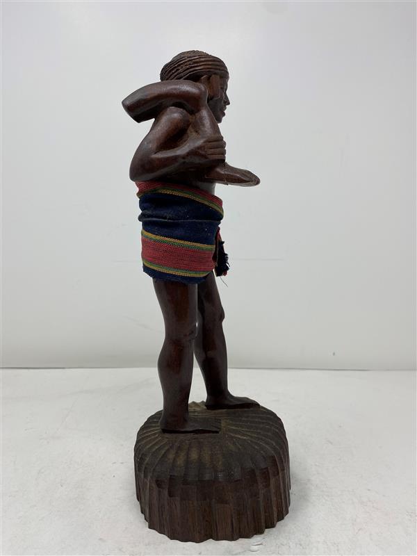 Hand-Carved Wooden Tribal Statue with Traditional Attire