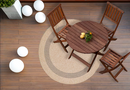 Origin 21 5-ft x 5-ft Loomed Polypropylene Black/Tan Round Outdoor Solid Hose Washable Pet Friendly Area rug